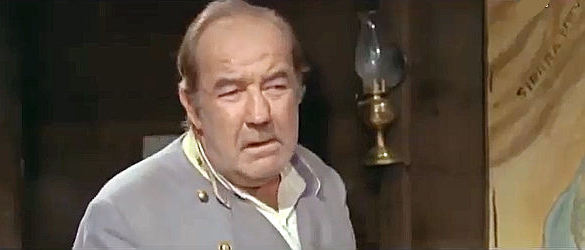 Broderick Crawford as Col. Lennox, commander of the endangered Fort Sharp in Mutiny at Fort Sharp (1966)