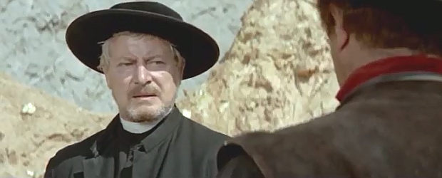 Dieter Borsche as Pastor Benson, doing some less than godly snooping in Massacre at Marble City (1964)
