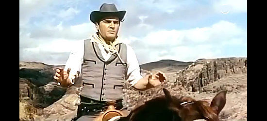 Edmund Purdom as Rex Kelly rides into an ambush while seeking his wife and child in Last Ride to Santa Cruz (1964)