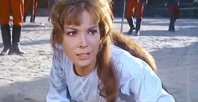 Elisa Montes as Brenda, watching her Indian friend Kiola being killed by soliders in Mutiny at Fort Sharp (1966)
