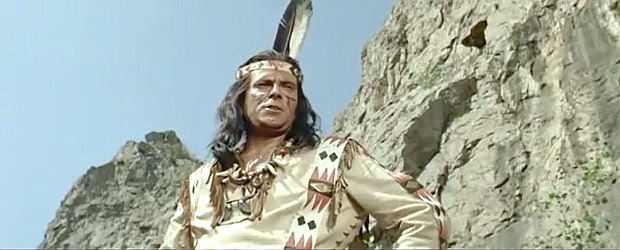 Jan Divis as Chief Burning Arrow, issuing a warning to the settlers in Massacre at Marble City (1964)