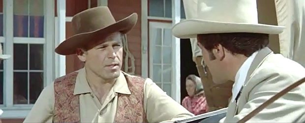 Jaroslav Rozsíval as Sheriff Anderson informing Matt Ellis that one of his men has been accused of murder in Massacre at Marble City (1964)