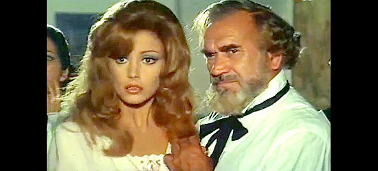 Maria Pia Conte as Isabel and Jose Jaspe as Gov. Don Fernando witness a duel between two Zorros in Zorro's Latest Adventure (1969)