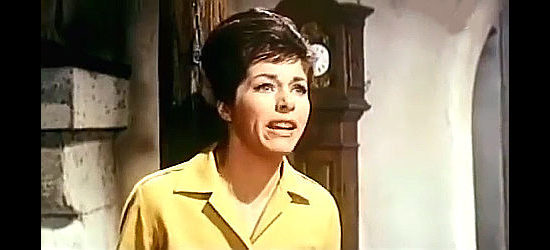 Marianna Koch as Elizabeth Kelly, concerned over bandit Pedro Ortiz's intention in Last Ride to Santa Cruz (1964)
