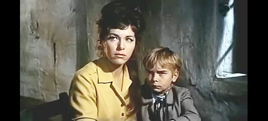 Marianna Koch as Elizabeth Kelly, trying to comfort son Steve (Florian Kuehne) as Pedro Ortiz becomes more violent in Last Ride to Santa Cruz (1964)