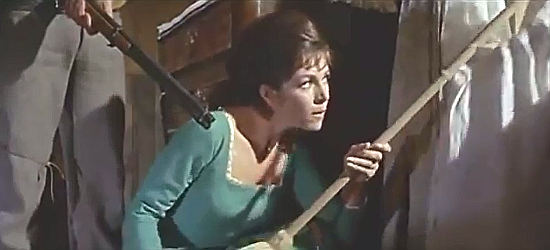 Marianne Koch as Bea Burdette, using a white flag to help Johnny Ringo escape capture in Who Killed Johnny R? (1966)