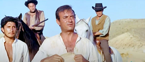 Antonio Almoros as Manuel Pereda, one of the leaders among the Mexican peons in Man From Canyon City (1965)