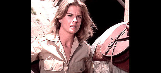 Candice Bergen as Miss Jones, realizing there's been an unexpected change of plans in Bite the Bullet (1975)