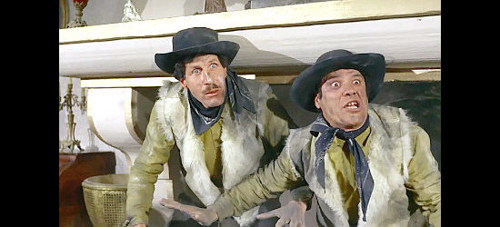 Ciccio (Ciccio Ingrassia) and Franco (Franco Franchi) realize they're dropped into the wrong room in Fistful of Knuckles (1965)