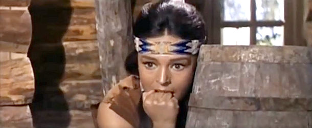 Diana Lorys as Flower of the Mountain, watching Paul White fight the bad guys in Cavalry Charge (1964)