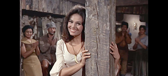 Diana Lorys as Nina, entertaining the trappers at the trading post with her song in Canadian Wilderness (1965)