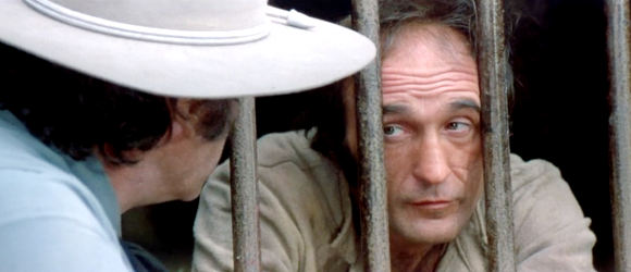 Dominic Barto as Monkey Smith, waiting for his friends to break him out of jail in Man of the East (1972)