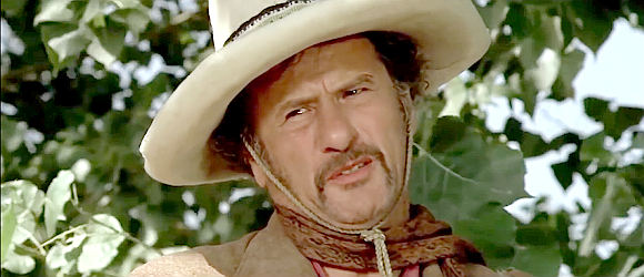 Eli Wallach as Alfonso Lozoya, reassuring Orlowsky that he can be trusted in Don't Turn the Other Cheek (1971)