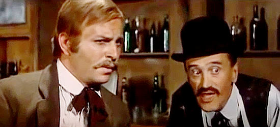 Ennio Girolami as saloon owner Bruce and bartender Willy (Silvio Bagolini) conspire on conning two newcomers in Two R-R-Ringos from Texas (1967)