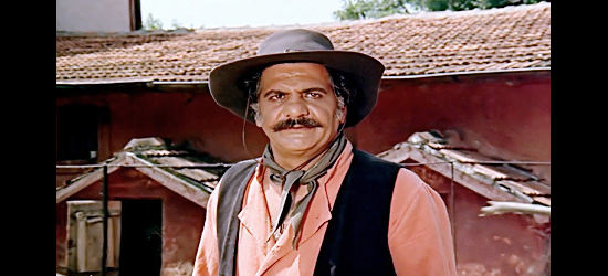 Erol Tas as Kahya, forman on the kid's mother's ranch in The Little Cowboy (1973)