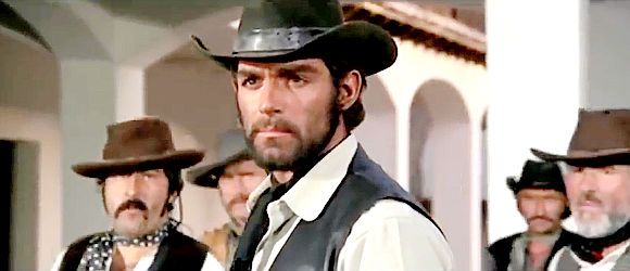 Fabio Testi as Roy Greenfield, realizing he's walked into a trap set by Redfield in Dead Men Ride (1971)