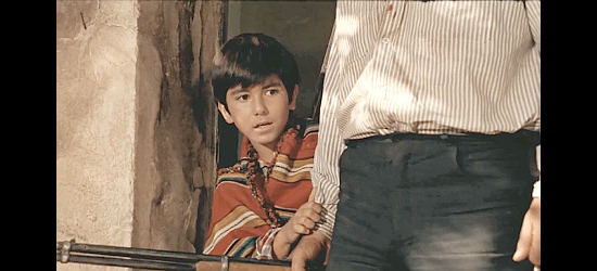Fabrizio Mondello as Juan knows trouble is coming after Martin Rojas dispatches of two Trevor men in Death Knows No Time (1968)