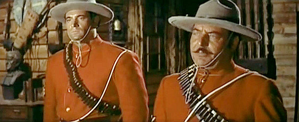 Fernando Bibao as Brighton and Alfonso Rojas as Sgt. Custer, two of the officers serving under Bedford in Cavalry Charge (1964)