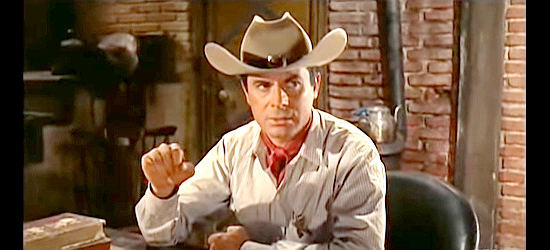Fernando Lopez (Fred Canow) as Sheriff Paul, dealing with a string of murders in Four Bullets for Joe (1964)