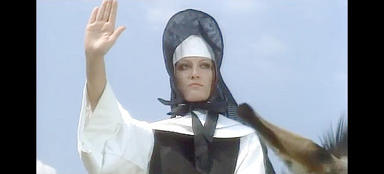 Fiorella Gaigano (Lea Gargano) as Mother Superior, halting a stagecoach in Seven Nuns in Kansas City (1973)