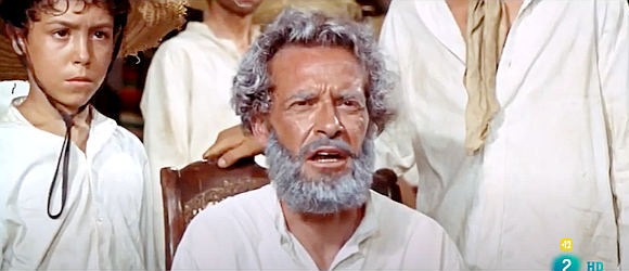 Francisco Sanz as Evaristo, an old-timer nearly lynched by Morton's men in Man From Canyon City (1965)
