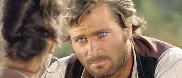Franco Nero as Don Jose, already on the run, listening to Carmen's latest plan in Man, Pride and Vengeance (1967)