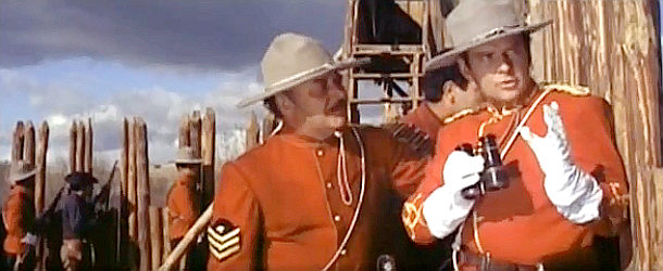 Frank Latimore as Inspector John Bedford and Alfonso Rojas as Sgt. Custer talk strategy in Cavalry Charge (1964)