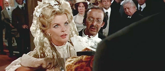 Gisela Hahn as the bride who helps Prince Dimitri Orlowsky rob her wedding guests in Don't Turn the Other Cheek (1971)