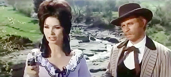 Gloria Paul as Evelyn and Ennio Girolami as Bruce catch up with Franco and Ciccio in Two R-R-Ringos from Texas (1967)