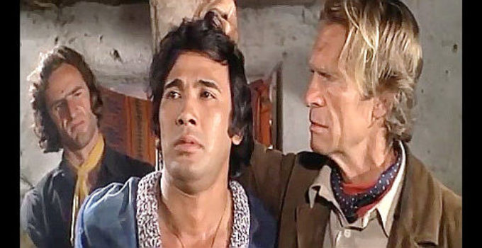 Gordon Mitchell as Jack Mason tries to make Tiger (Krung Krivilai) talk in Tiger from the River Kwai (1975)