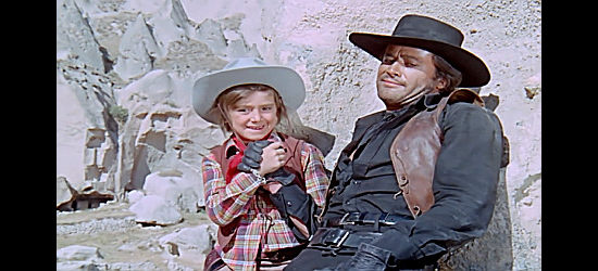Iker Inanoglu as Yumurcak and Cuneyt Arkin as Keskin celebrate a job well done in The Little Cowboy (1973)