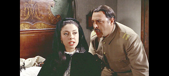 Jesus Puente as Capt. Hernandez encounters another surprise, the wrong woman in his wife's bed (Monica Randall as Carmencita) in Fistful of Knuckles (1965)