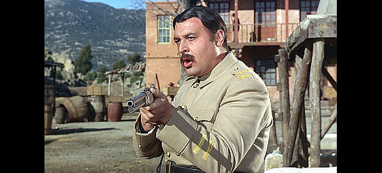 Jesus Puente as Capt. Hernandez, preparing for a showdown with Franco and Ciccio in Fistful of Knuckles (1965)