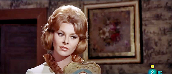 Loredana Nusciak as Viviane Barrett, with her soothing music box in Man From Canyon City (1965)