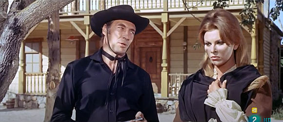 Louis Davila as Ray dispensing some six-gun wisdom to Viviane Barrett (Loredana Nusciak) in Man From Canyon City (1965)