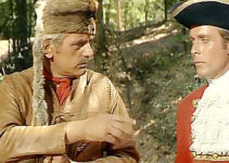Luis Induni as Hawkeye and Jack Taylor as Maj. Duncan Heywood talk strategy in Fall of the Mohicans (1965)