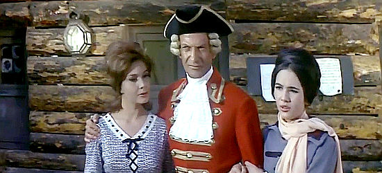 Maria Gentilini (Barbara Loy) as Alice Munro (left) and Sara Lezana as Cora Munro reunited with Col. Munro (Paul Muller) in Fall of the Mohicans (1965)