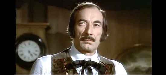 Mario Dani as Madison (or Harrison), one of the two men determined to find the maps in Seven Nuns in Kansas City (1973)