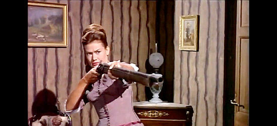 Mary Anderson as Barbara does some convincing the hard way in Heroes of the West (1964)