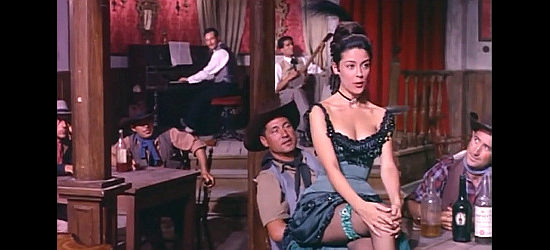 Monica Randall as Sherry, ready to grace the crowd with a tune in Heroes of the West (1964)