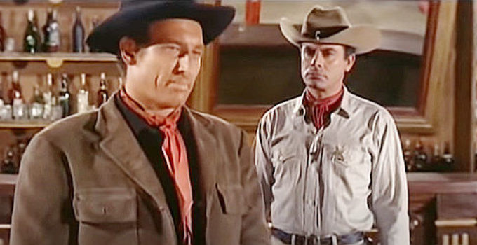 Paul Piaget as Frank Dalton and Fernando Lopez (Fred Canow) as Sheriff Paul discuss the former's quest for vengeance in Four Bullets for Joe (1964)