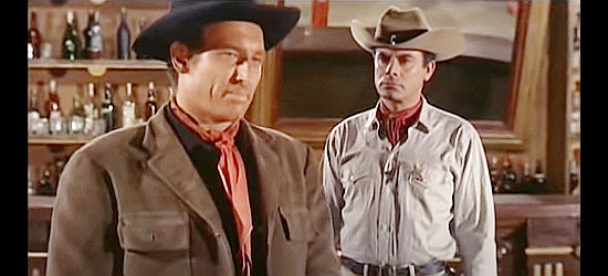 Paul Piaget as Frank Dalton and Fernando Lopez (Fred Canow) as Sheriff Paul discuss the former's quest for vengeance in Four Bullets for Joe (1964)