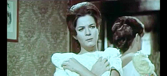 Rita Ferrel, wondering why Jose Desmet has barged into her room unannounced in The Cold Killer (1966)