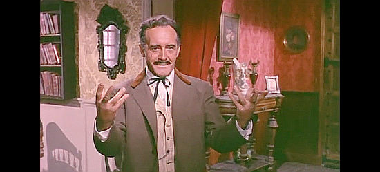 Tomas Blanco as Mayor Ortes, marveling over his own plan in Heroes of the West (1964)