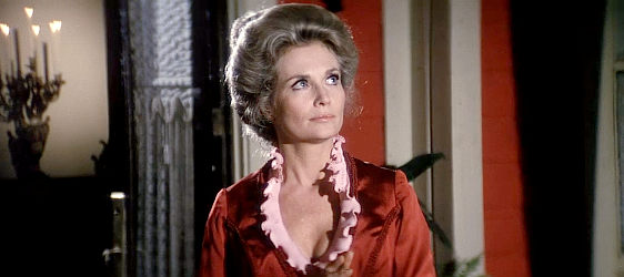 Beth Brickell as Carla Ross, the hotel owner who plays host to Nightingale in Posse (1975)