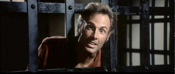 Bruce Stern as Jack Strawhorn, jailed by Nightingale and looking for a way out in Posse (1975)