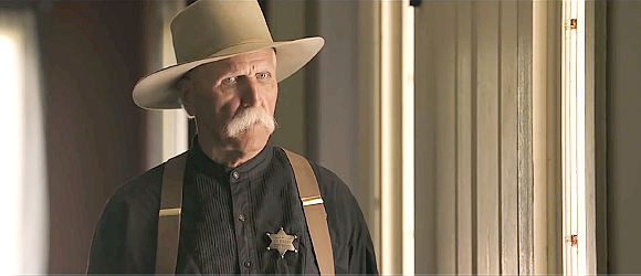 Cotton Yancey as Sheriff Dan Lee, putting his life on the line to get Joe to surrender in Blood Country (2017)