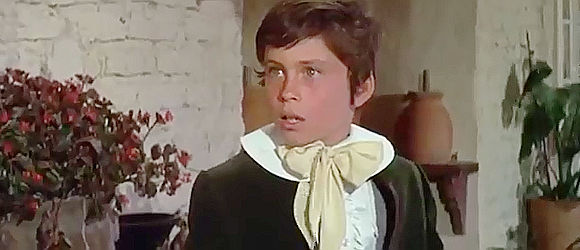 Ethan Wayne as Little Jake McCandles,, startled by the Fain Gang's raid in Big Jake (1971)