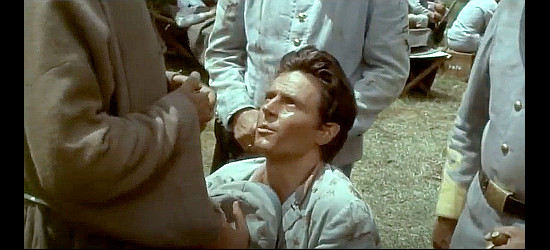 Giovanni Ivan Scratuglia as the Rebel soldier wanting to confess when The Ugly and The Stupid pretend to be priests in The Handsome, the Ugly and the Stupid (1967)