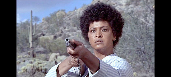 Gloria Foster as Ivy Revers, ordering a white man off her property in Man and Boy (1971)
